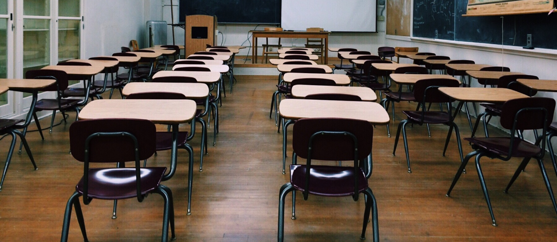 Empty-Classroom-Desks-and-Chairs