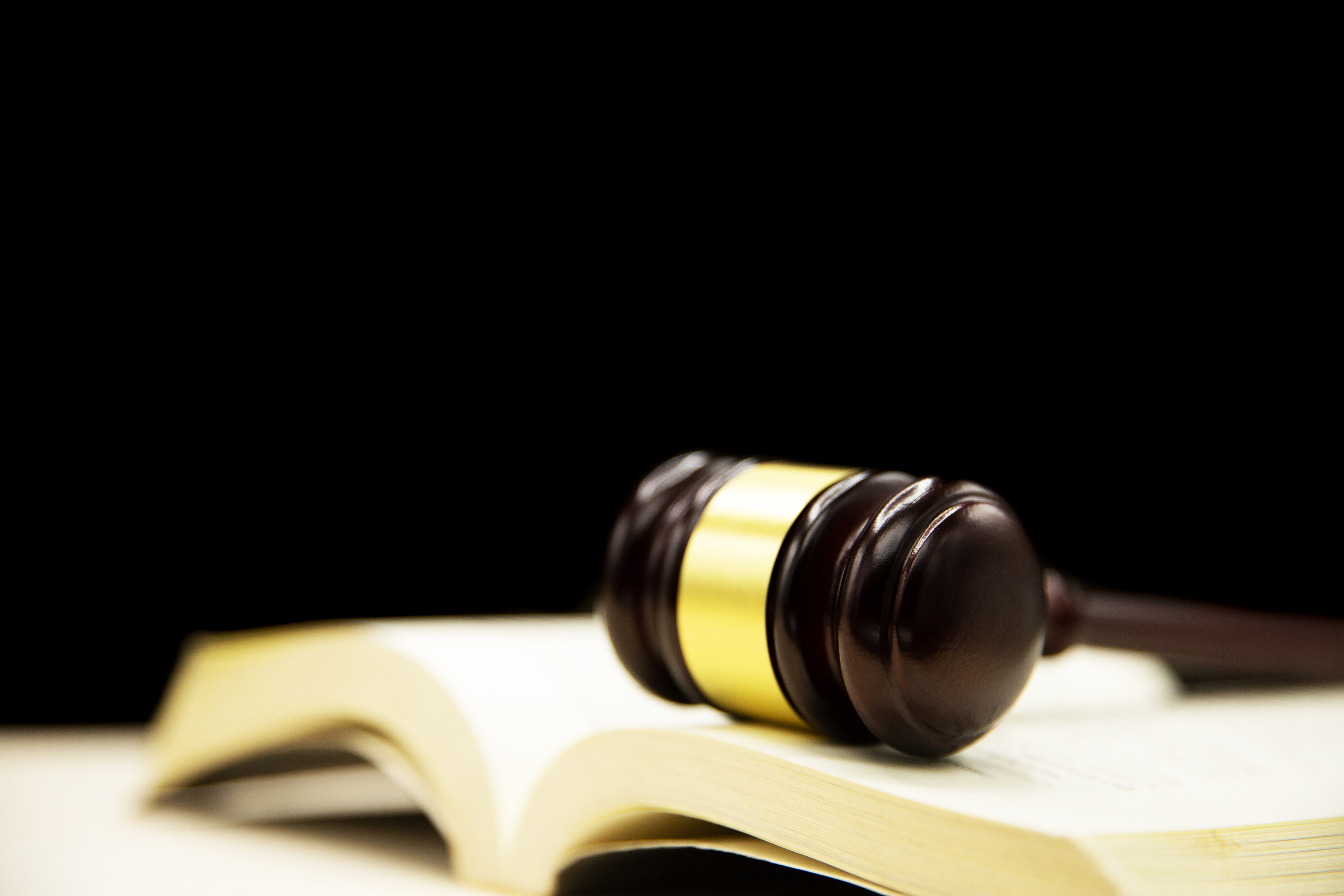 judge-gavel-on-book-and-wooden-table