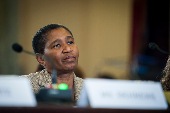 Michele-Roberts-Sitting-at-a-Table