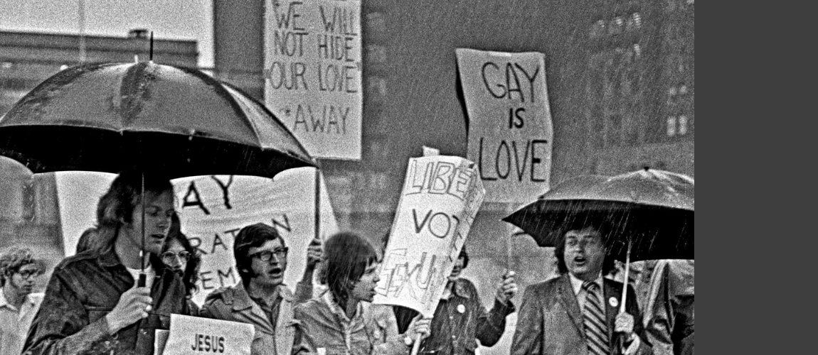 We-Demand-Demonstration-Protestors-with-Gay-is-love-signs-in-the-rain