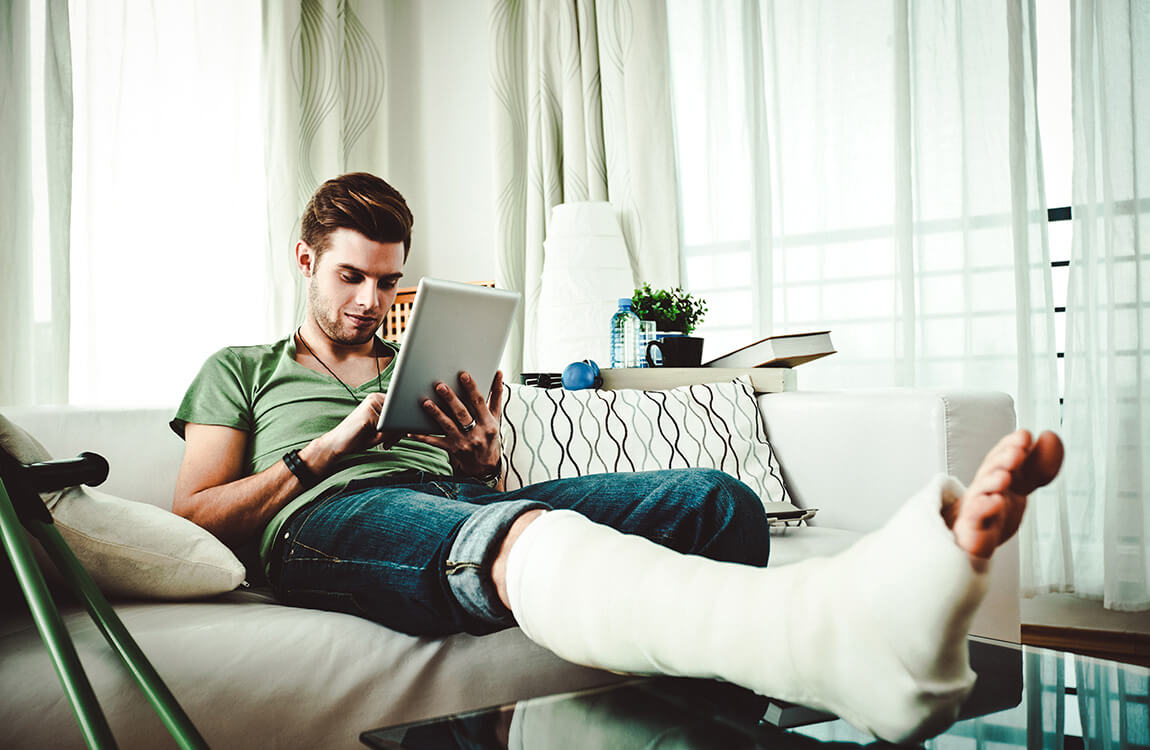 young-man-broken-leg-at-home